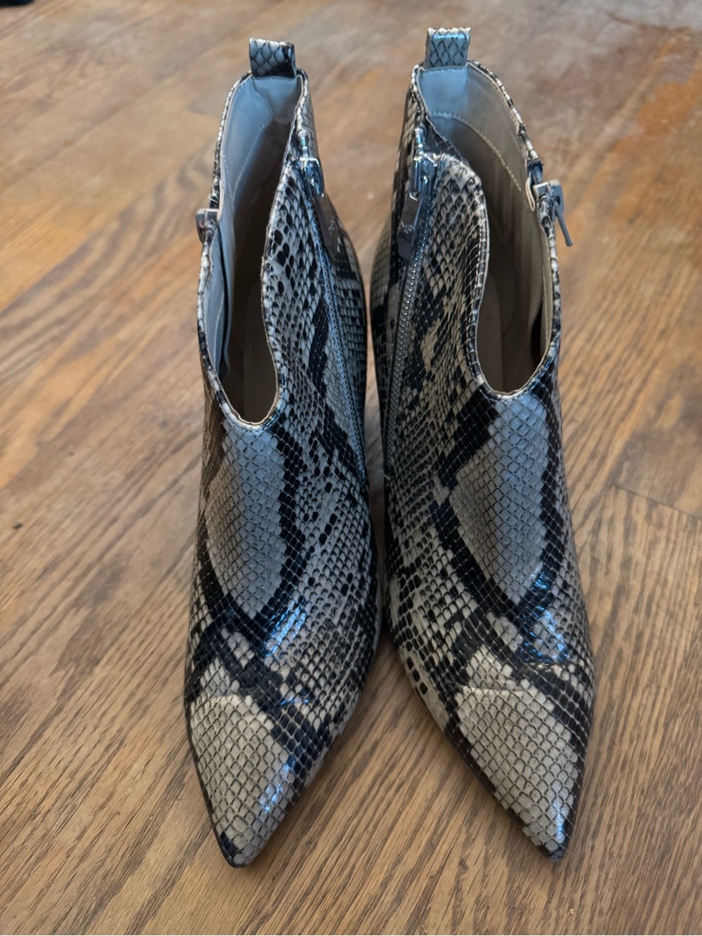Snake print leather booties